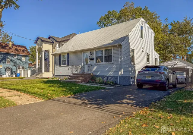 a house view with a garden space