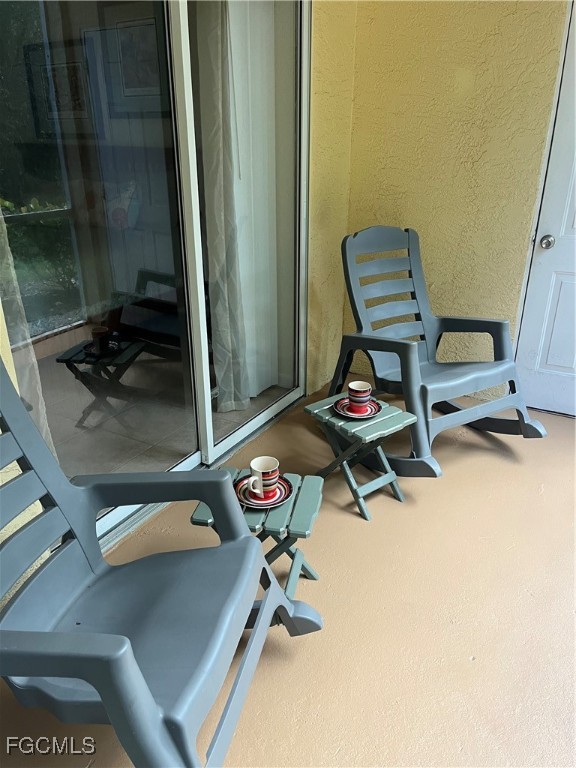 6401 Aragon Way, Unit 107 Fort Myers, FL 33966 - Photo 18 of 28 a living room with a furniture