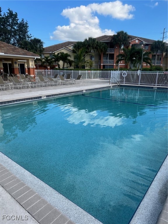 6401 Aragon Way, Unit 107 Fort Myers, FL 33966 - Photo 21 of 28 a view of a house with a yard