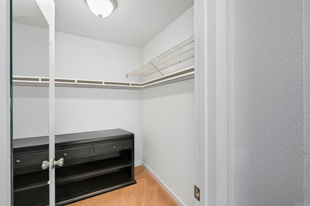 a room with racks on the wall