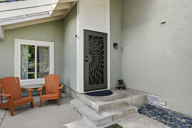 a building outdoor space with patio furniture