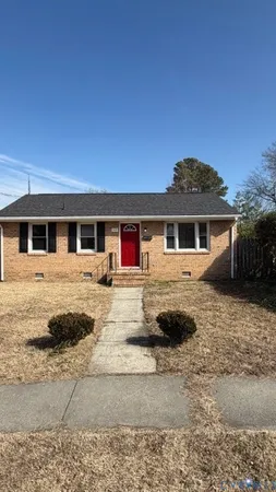 a front view of a house with a patio