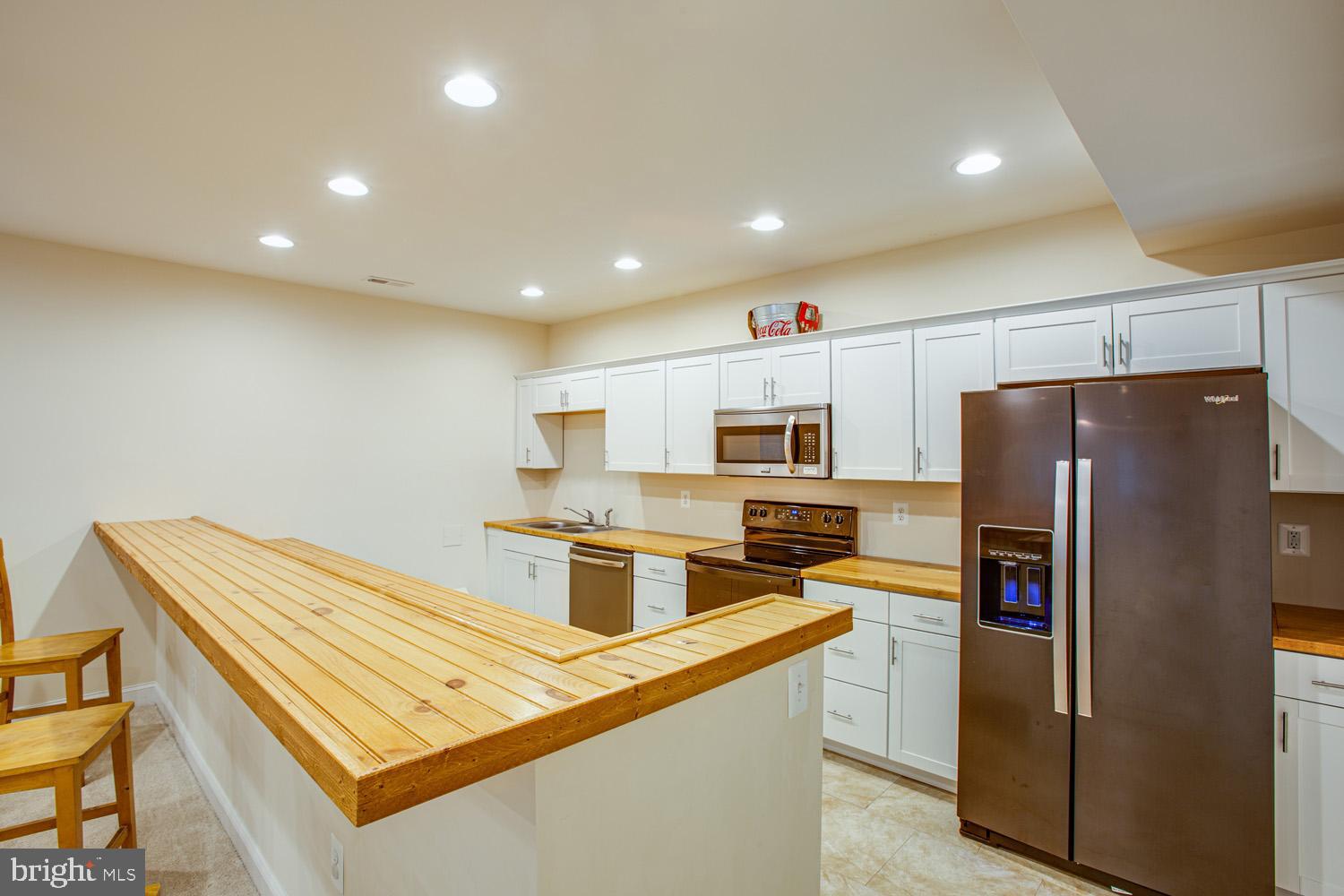 2252 Partlow Road Beaverdam, VA 23015 - Photo 32 of 52 Gorgeous wood countertops - basement kitchenette
