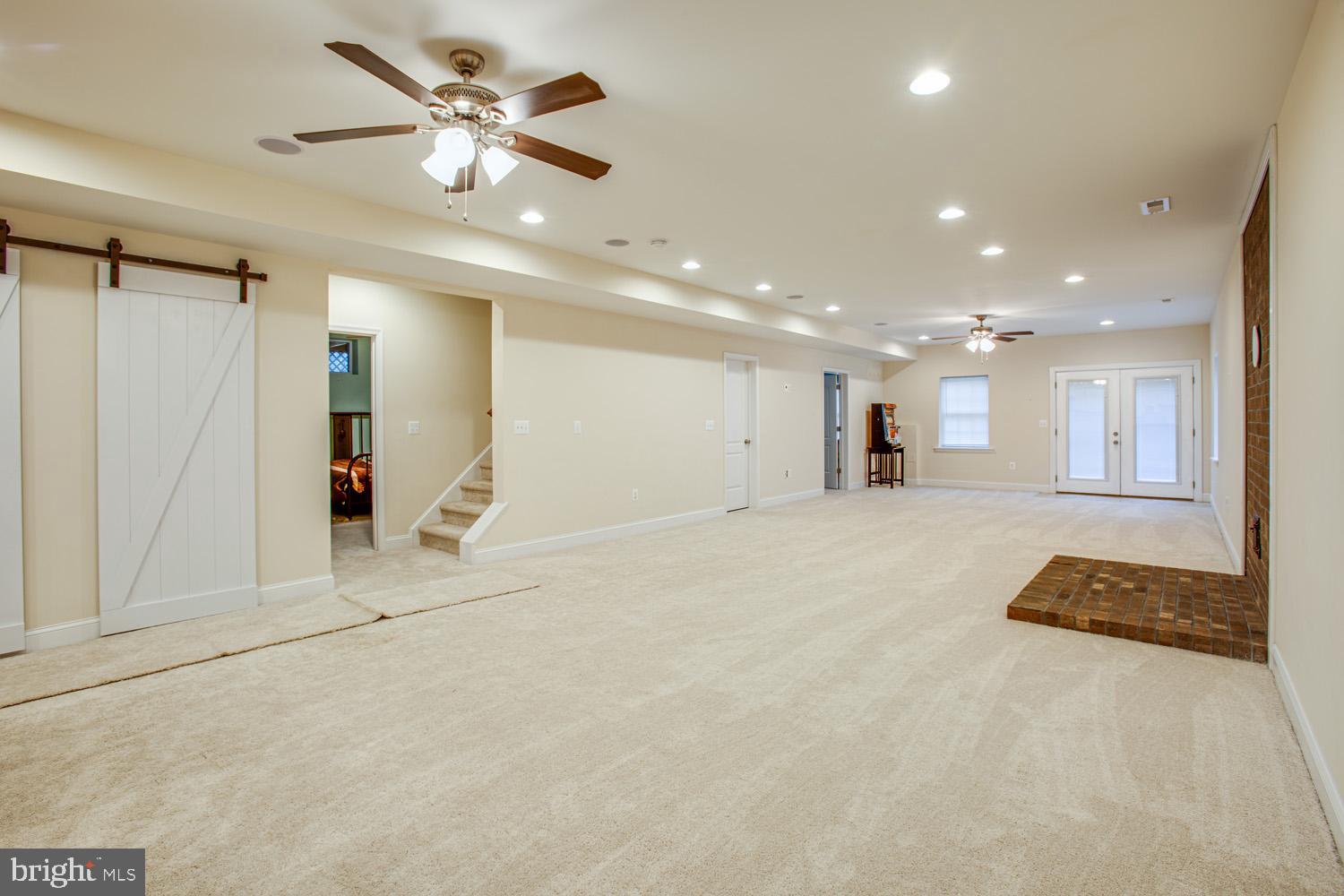 2252 Partlow Road Beaverdam, VA 23015 - Photo 35 of 52 Large recreation room with barn doors
