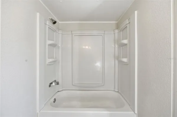 a bathroom with a bathtub