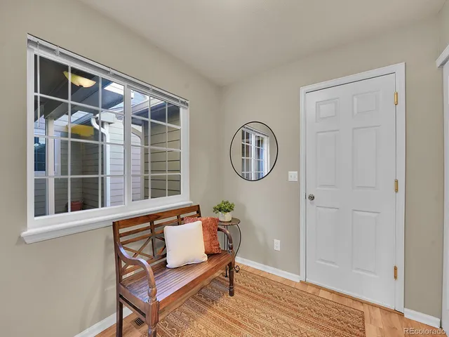 a view of a livingroom with furniture and window