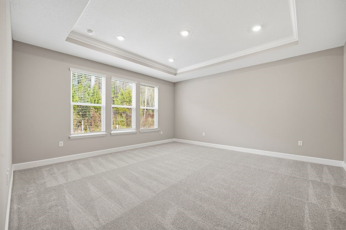 86049 Living Waters Run Yulee, FL 32097 - Photo 14 of 36 wooden floor in an empty room with a window