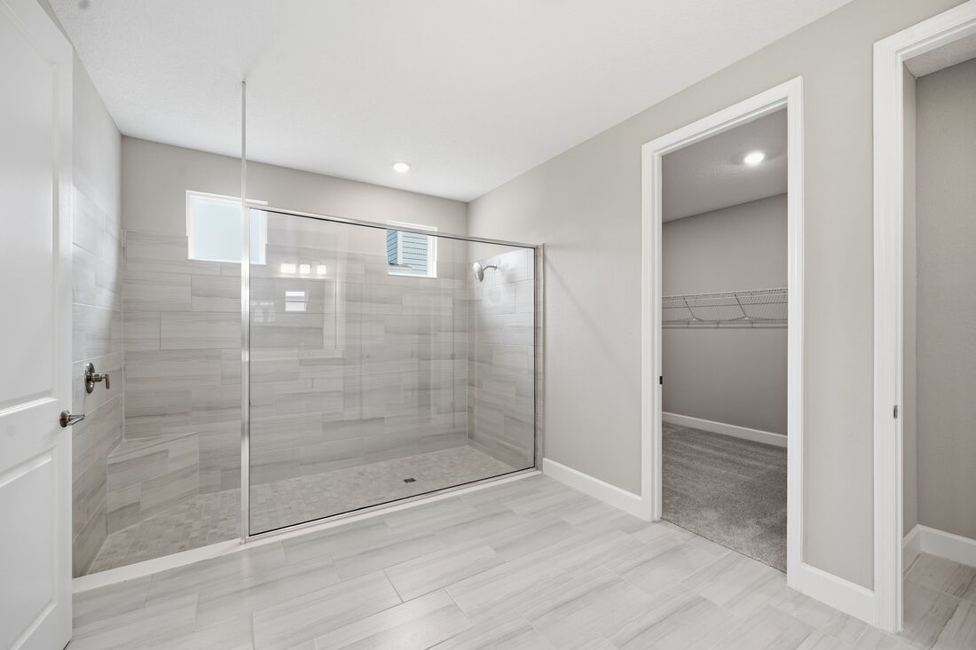 86049 Living Waters Run Yulee, FL 32097 - Photo 18 of 36 a bathroom with a shower