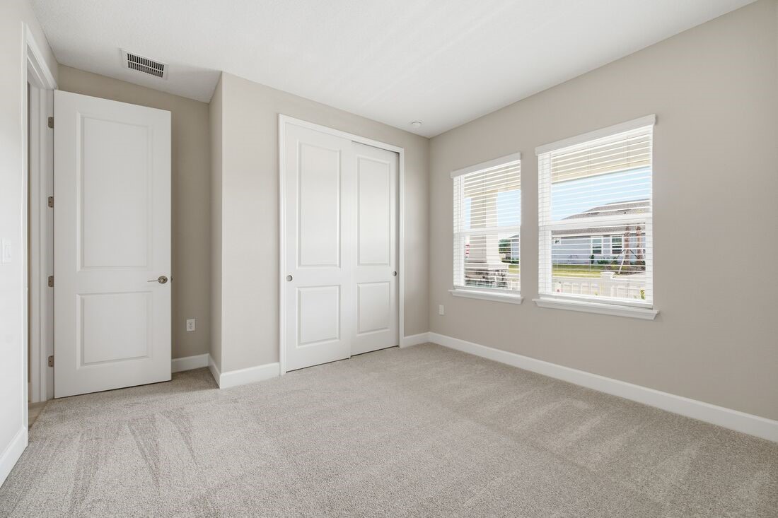 86049 Living Waters Run Yulee, FL 32097 - Photo 27 of 36 a view of an empty room with a window