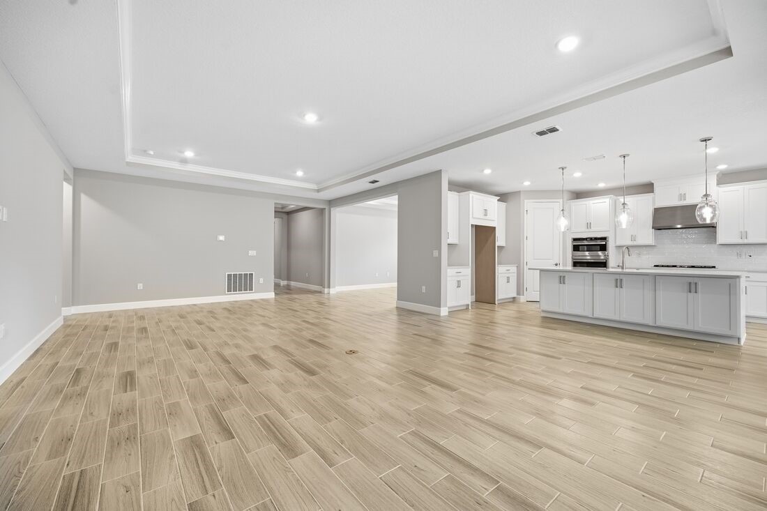86049 Living Waters Run Yulee, FL 32097 - Photo 10 of 36 a view of a kitchen with kitchen and stainless steel appliances