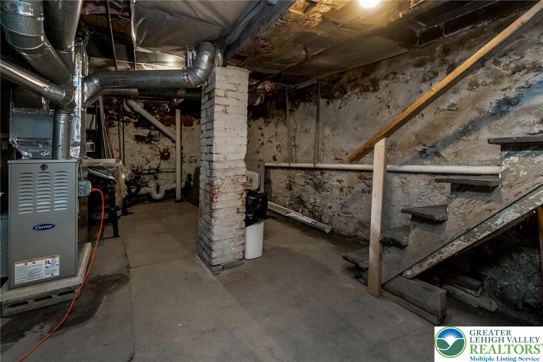 365 Rock Street Easton, PA 18042 - Photo 35 of 50 A well-maintained utility area featuring essential home systems and sturdy concrete flooring.