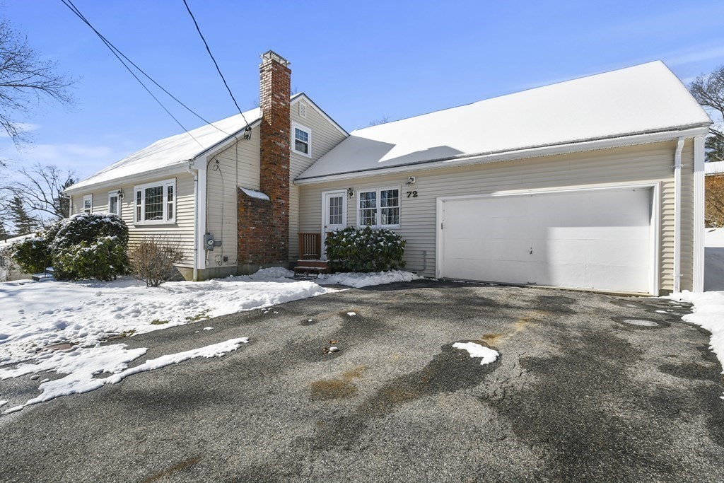 72 Old Bolton Road Hudson, MA 01749 - Photo 28 of 42 a front view of a house with a yard