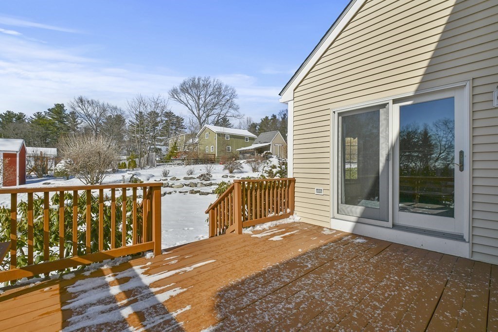 72 Old Bolton Road Hudson, MA 01749 - Photo 33 of 42 a view of a balcony with wooden floor and fence