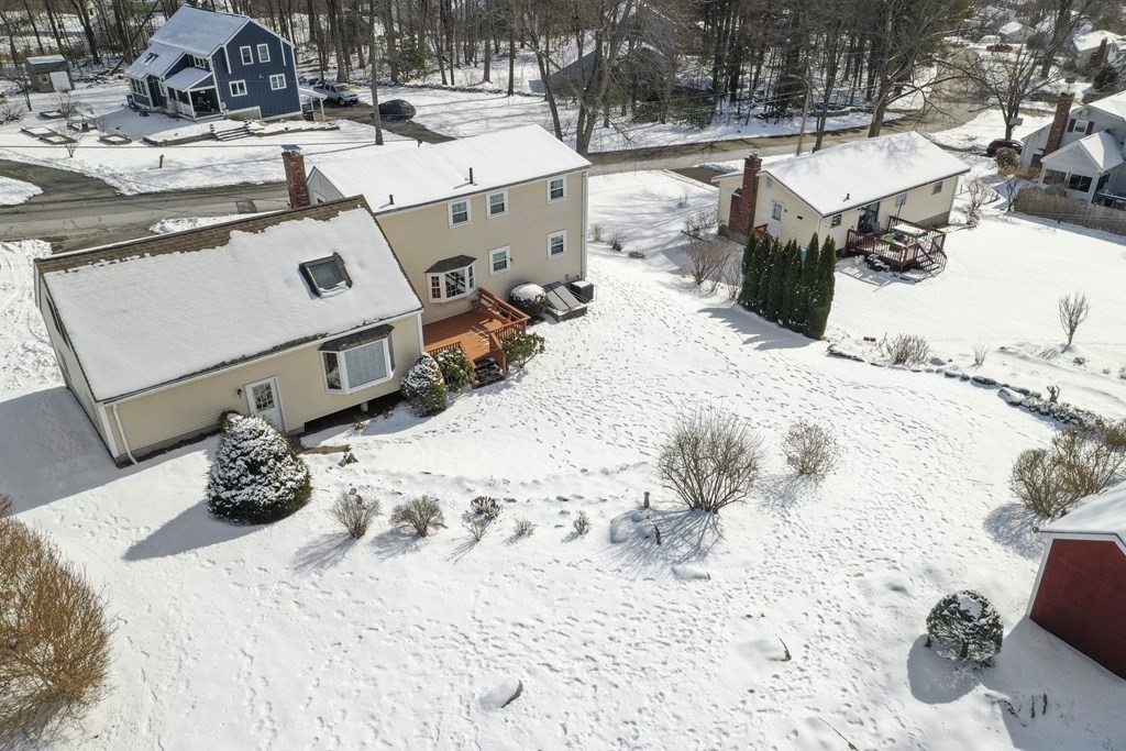 72 Old Bolton Road Hudson, MA 01749 - Photo 38 of 42 a view of a backyard of the house