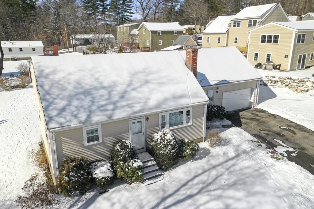 72 Old Bolton Road Hudson, MA 01749 - Photo 40 of 42 a view of a house with wooden fence