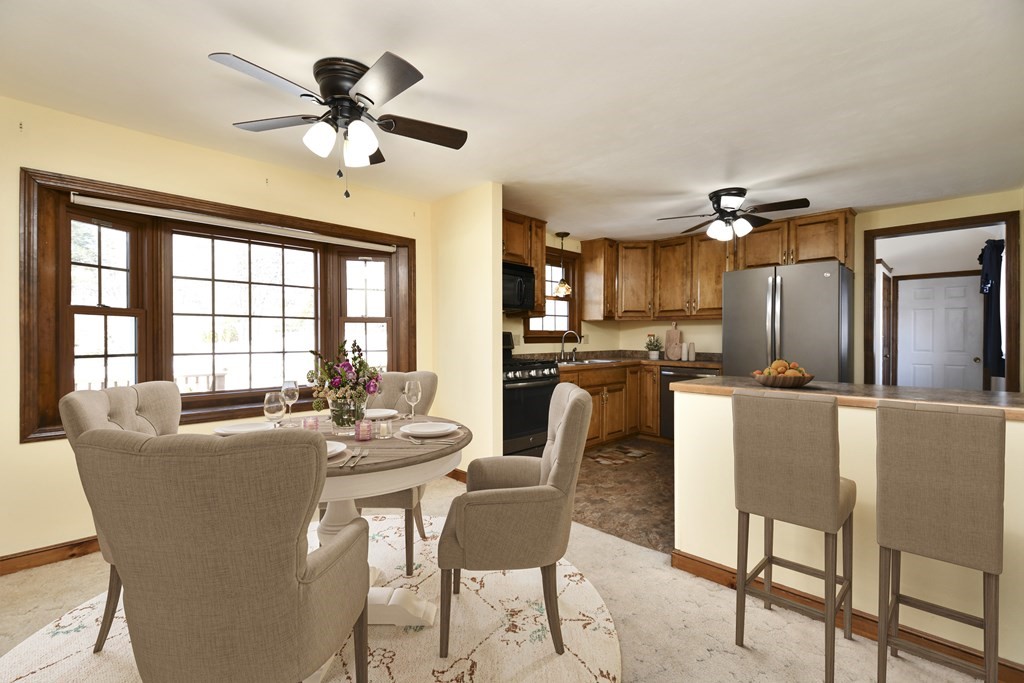 72 Old Bolton Road Hudson, MA 01749 - Photo 9 of 42 a dining room with furniture and window