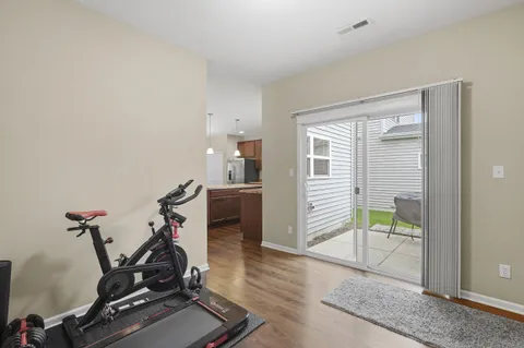 a view of a livingroom with furniture and windows