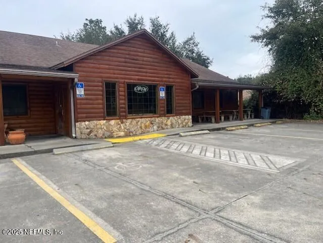 a view of a yard with a trampoline
