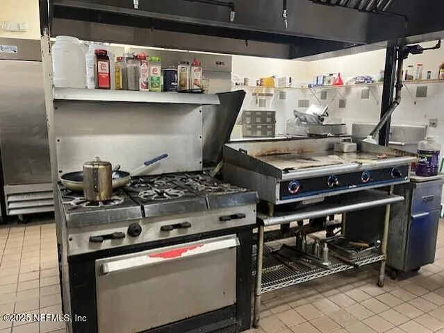 a bathroom with a shower and toilet