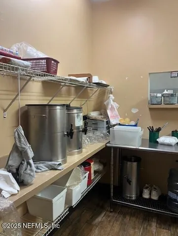 a view of a chairs and table in a patio