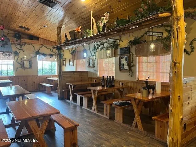 a view of a swimming pool with a yard