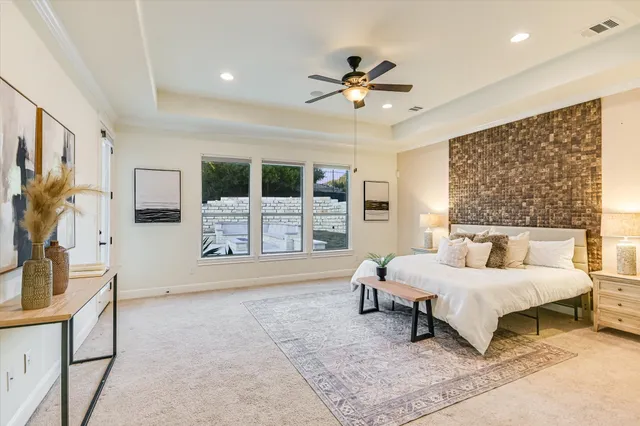a bathroom with a double vanity sink mirror and shower