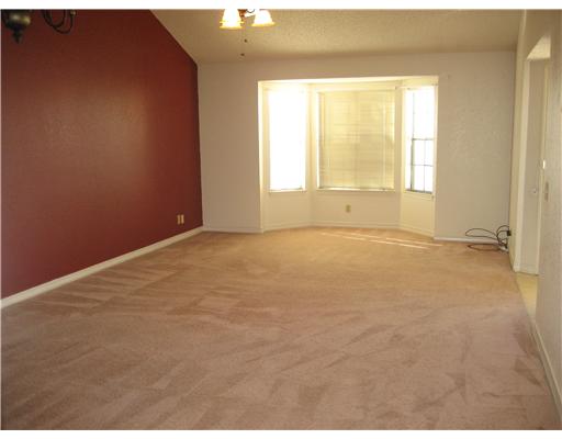 4445 Cedar Pass Drive, Unit 112 Corpus Christi, TX 78413 - Photo 2 of 7 a view of an empty room with a window