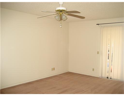 4445 Cedar Pass Drive, Unit 112 Corpus Christi, TX 78413 - Photo 5 of 7 a view of a small space with wooden floor