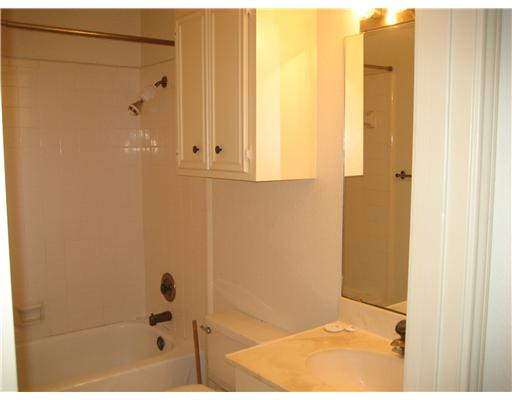 4445 Cedar Pass Drive, Unit 112 Corpus Christi, TX 78413 - Photo 6 of 7 a bathroom with a shower