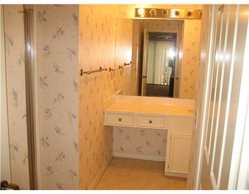 4445 Cedar Pass Drive, Unit 112 Corpus Christi, TX 78413 - Photo 7 of 7 a bathroom with a bathtub and a shower