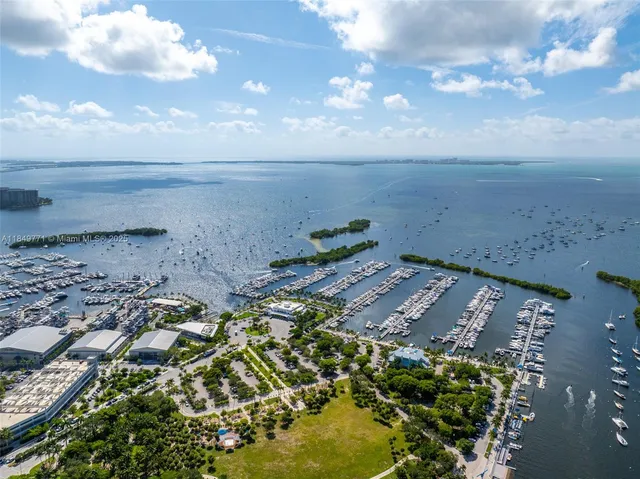 a picture of city view with lake view and mountain view in back