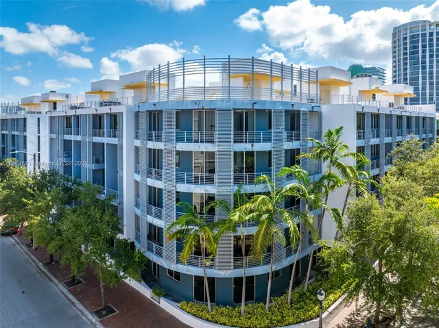 a view of city with tall buildings