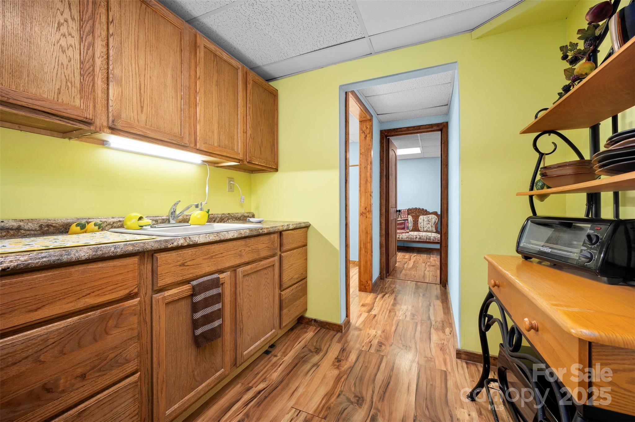 790 County Line Road Rutherfordton, NC 28139 - Photo 25 of 36 a kitchen with stainless steel appliances granite countertop a stove and a wooden floors