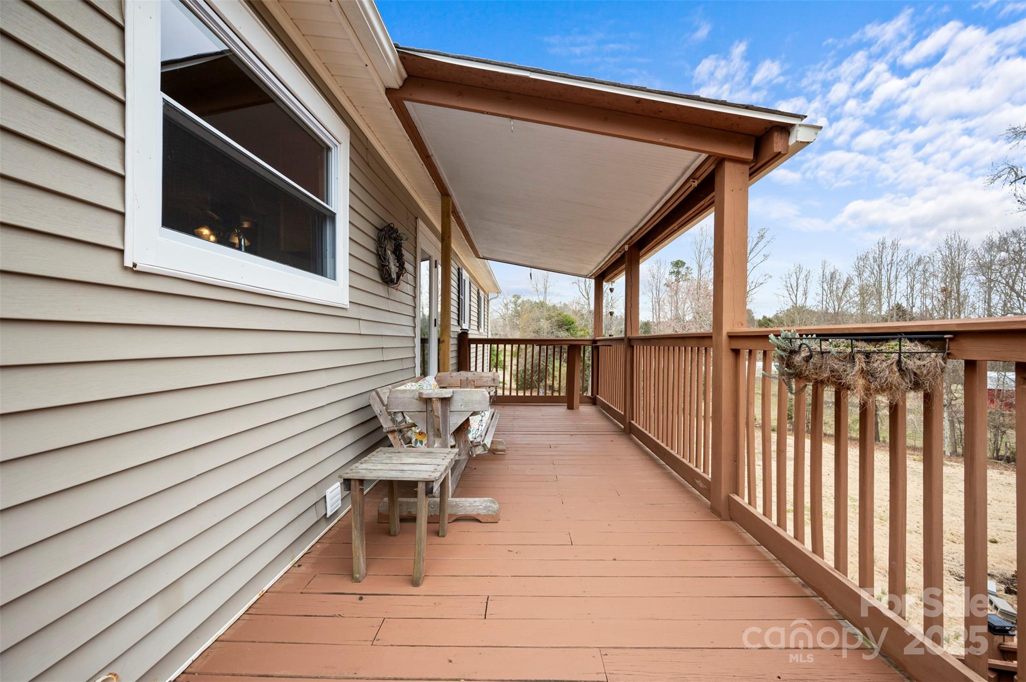 790 County Line Road Rutherfordton, NC 28139 - Photo 30 of 36 a balcony with wooden floor and furniture