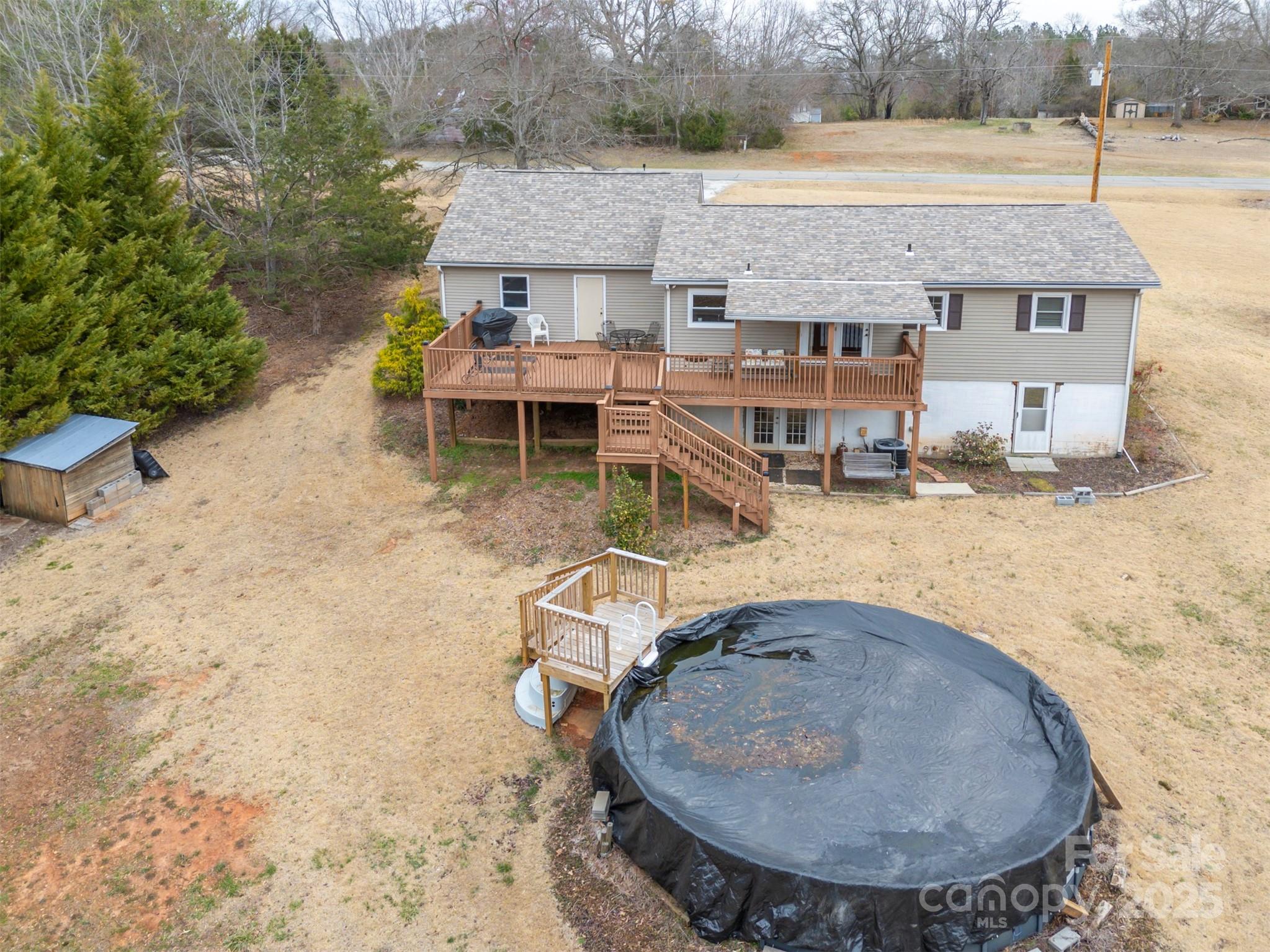 790 County Line Road Rutherfordton, NC 28139 - Photo 34 of 36 an aerial view of a house with a yard and lake view