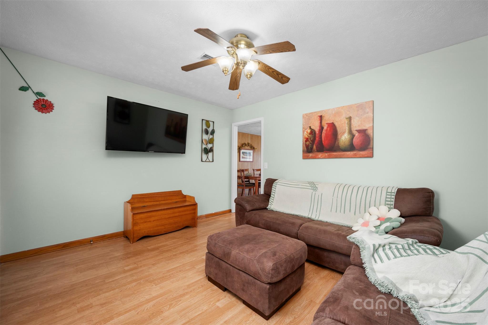 790 County Line Road Rutherfordton, NC 28139 - Photo 4 of 36 a living room with furniture and a flat screen tv