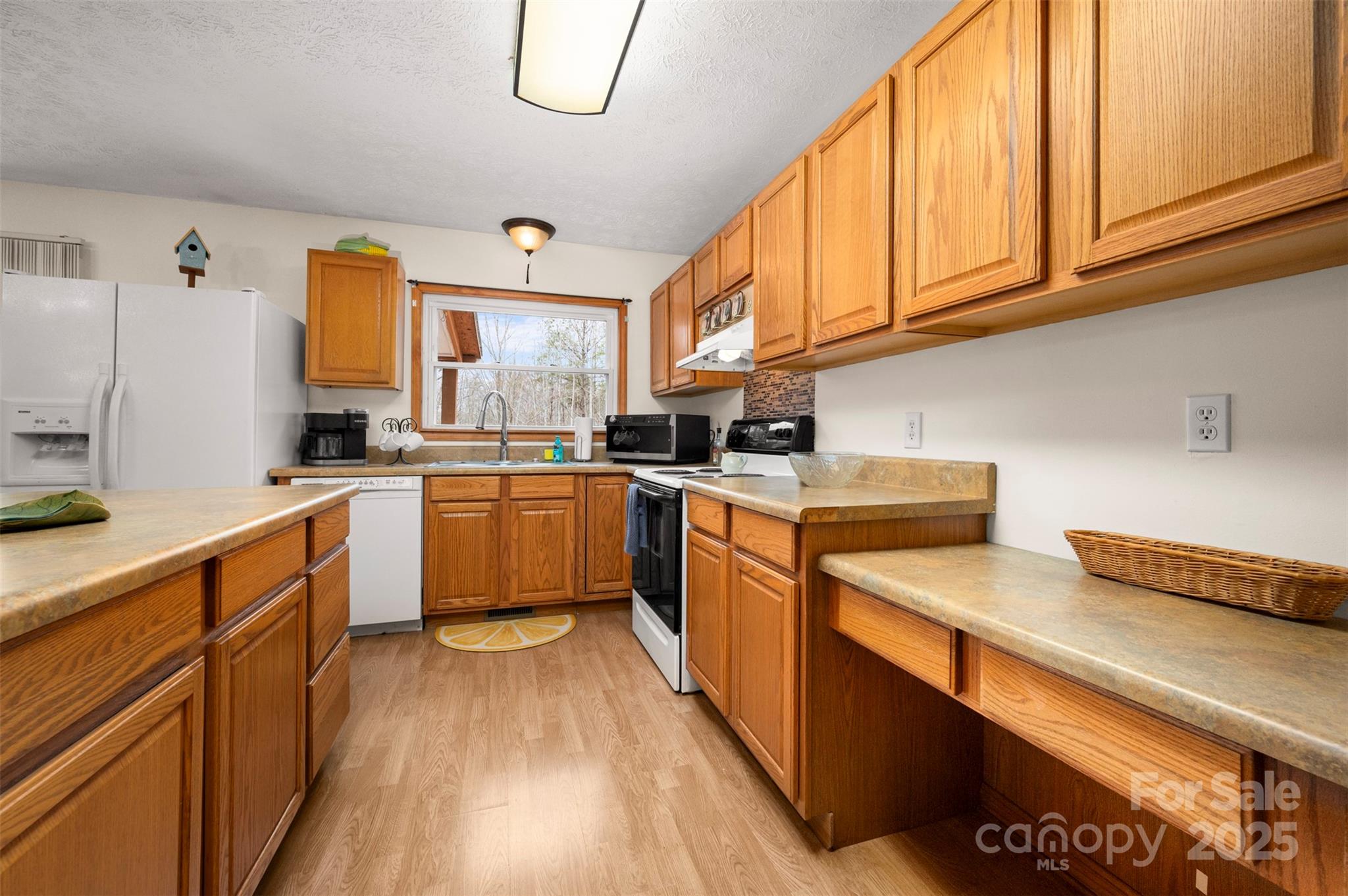 790 County Line Road Rutherfordton, NC 28139 - Photo 6 of 36 a kitchen with cabinets a sink and appliances