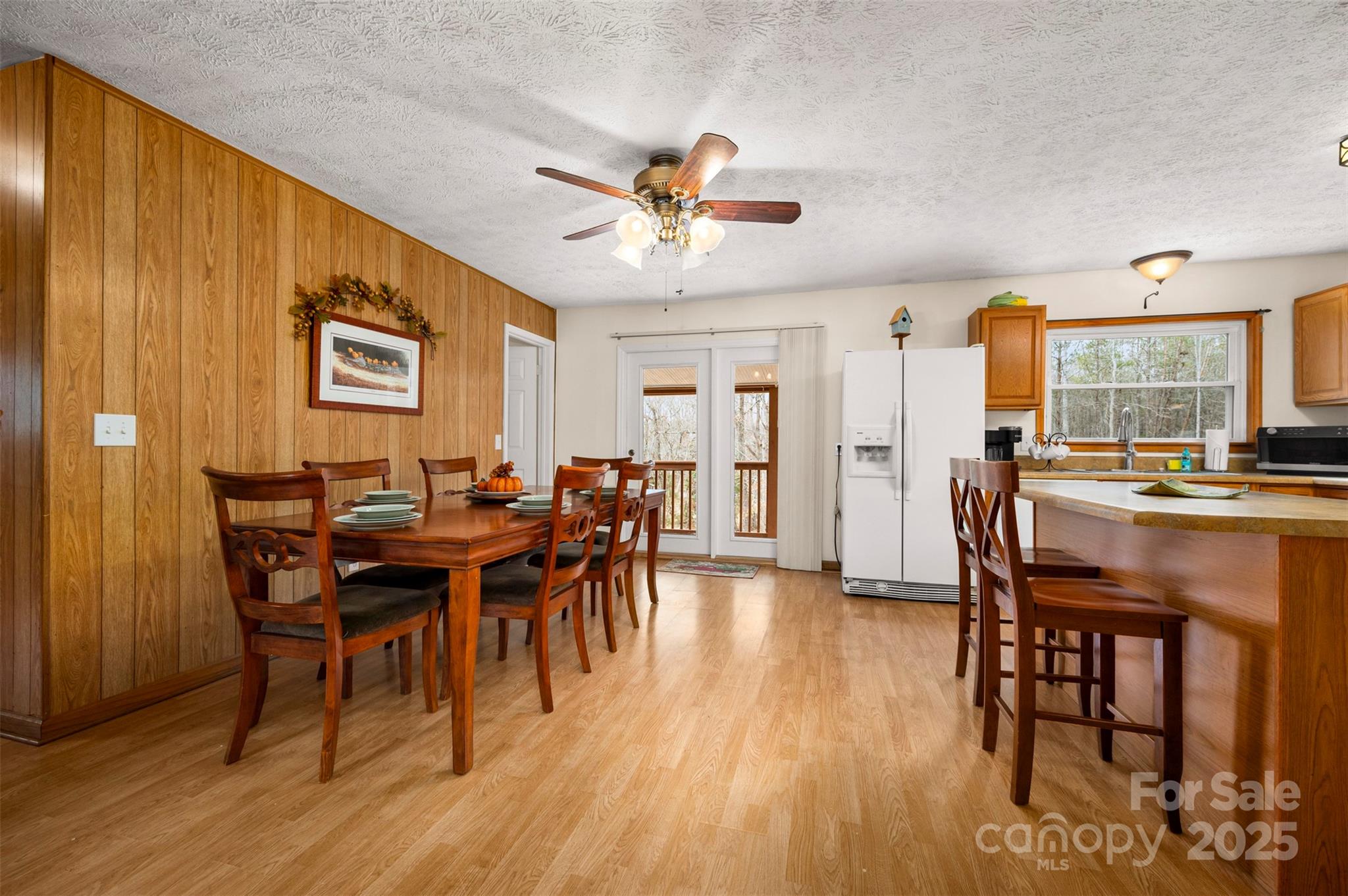 790 County Line Road Rutherfordton, NC 28139 - Photo 8 of 36 a view of a dining room with furniture and wooden floor
