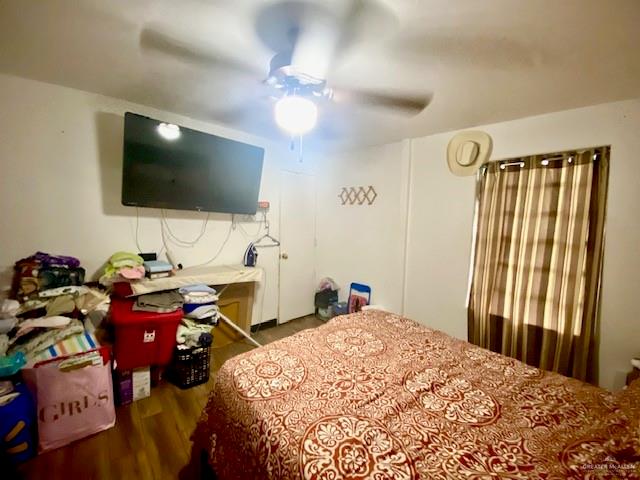 5910 Alpine Avenue Mission, TX 78574 - Photo 11 of 15 a bedroom with a bed and a flat screen tv