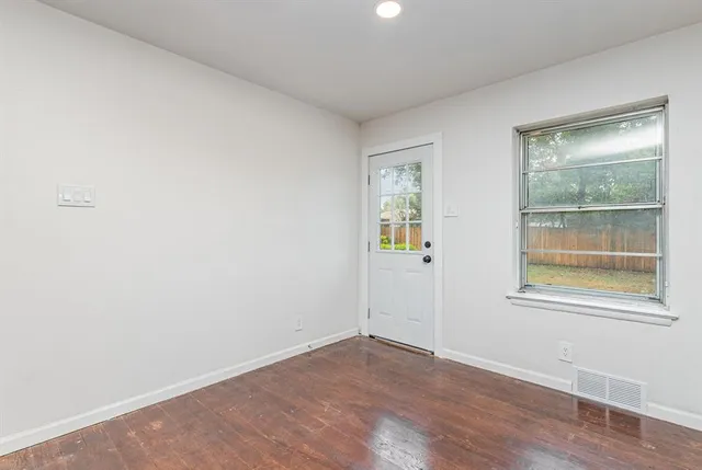 an empty room with a window