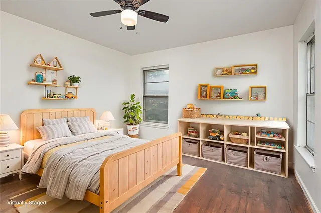 a bedroom with a bed and a cabinets
