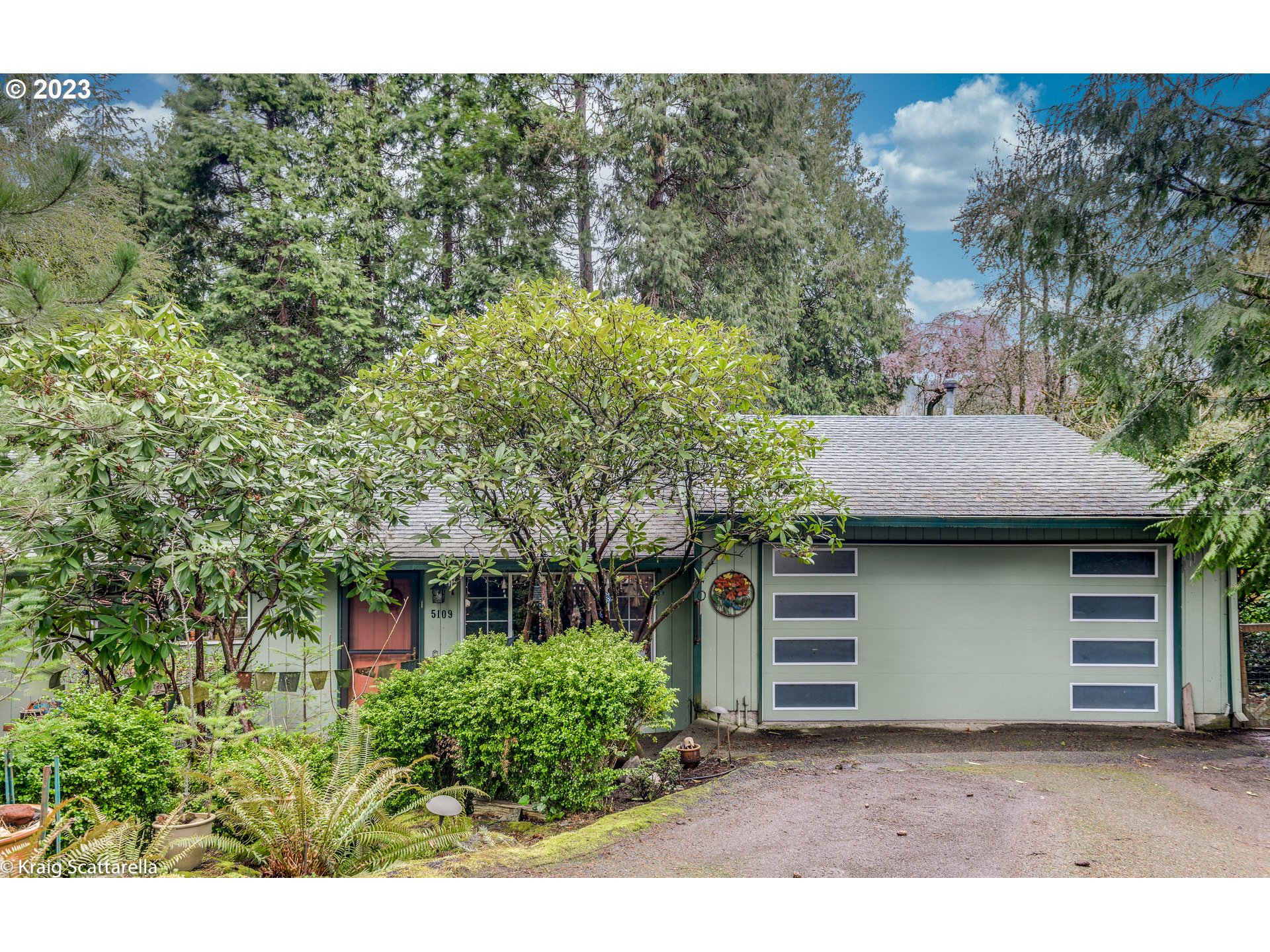 5109 Southwest Boundary Street Portland, OR 97221 - Photo 1 of 20 a view of a house with a yard