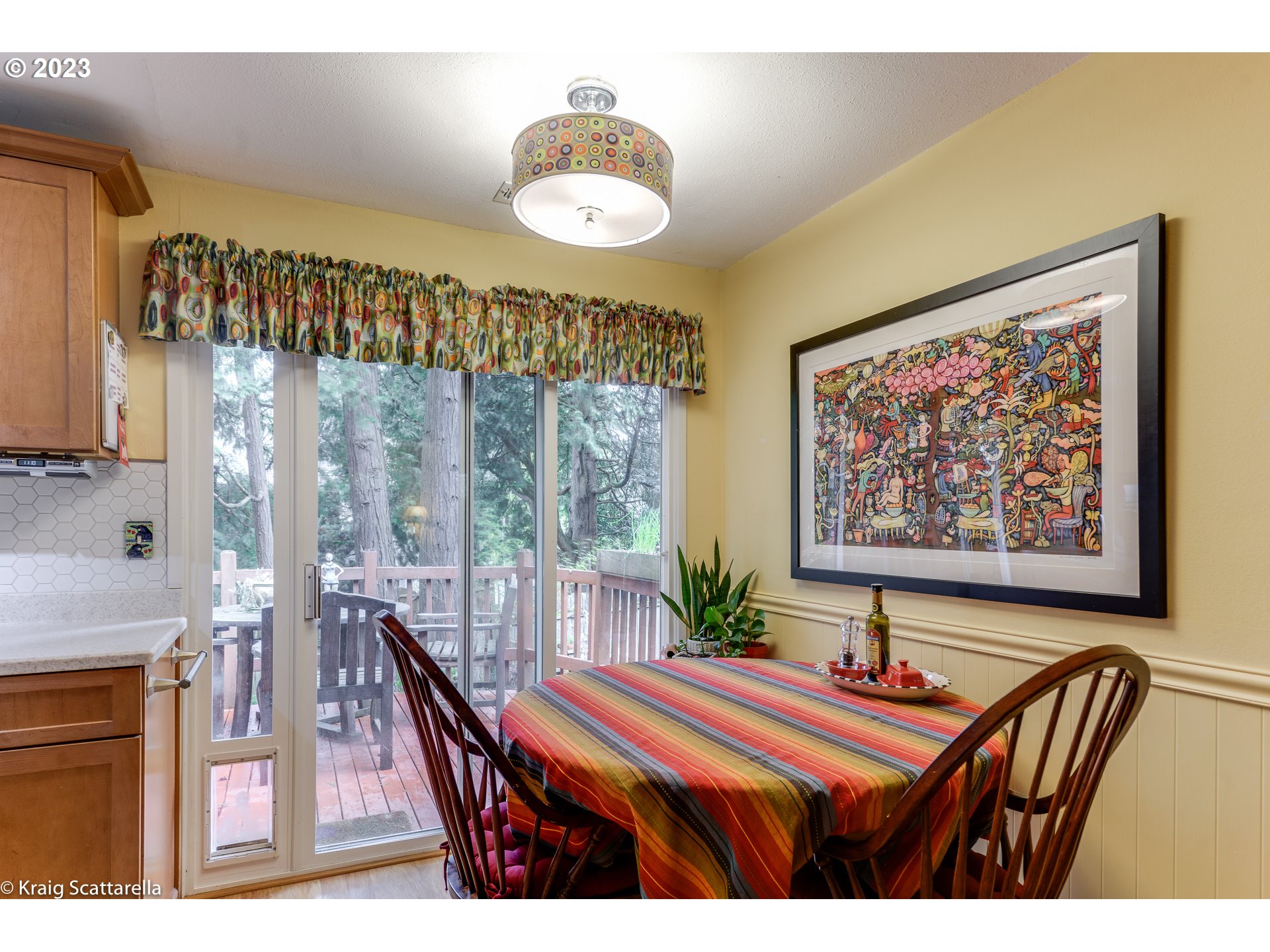 5109 Southwest Boundary Street Portland, OR 97221 - Photo 12 of 20 a view of a dining room with furniture and a large window