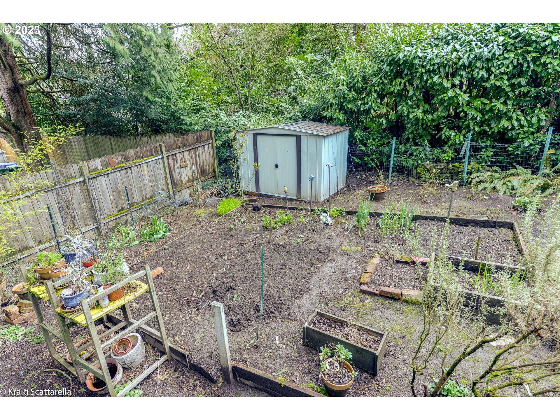 5109 Southwest Boundary Street Portland, OR 97221 - Photo 17 of 20 a backyard of a house with lots of green space