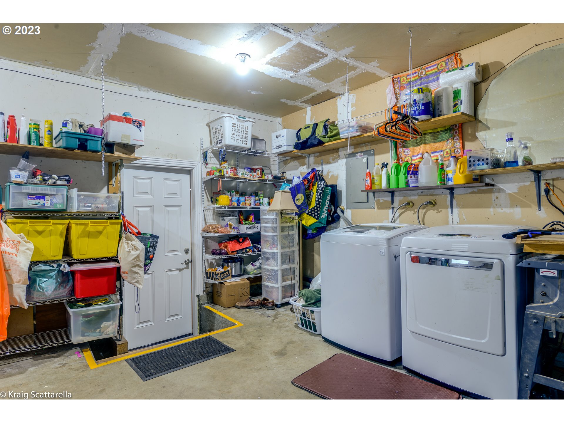 5109 Southwest Boundary Street Portland, OR 97221 - Photo 18 of 20 a storage room with washer and dryer
