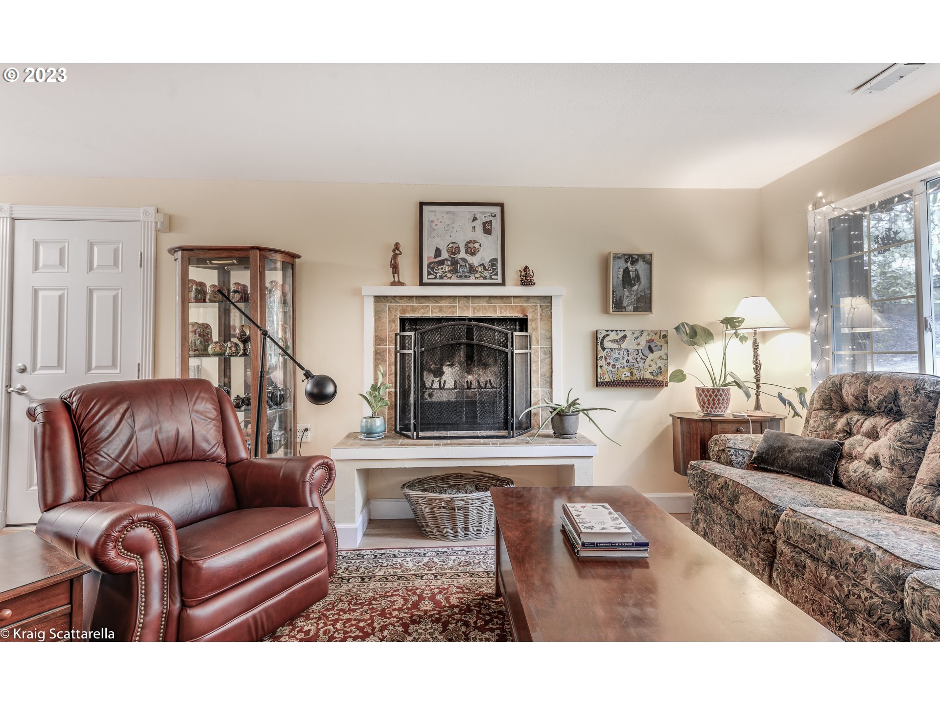 5109 Southwest Boundary Street Portland, OR 97221 - Photo 5 of 20 a living room with furniture and a fireplace