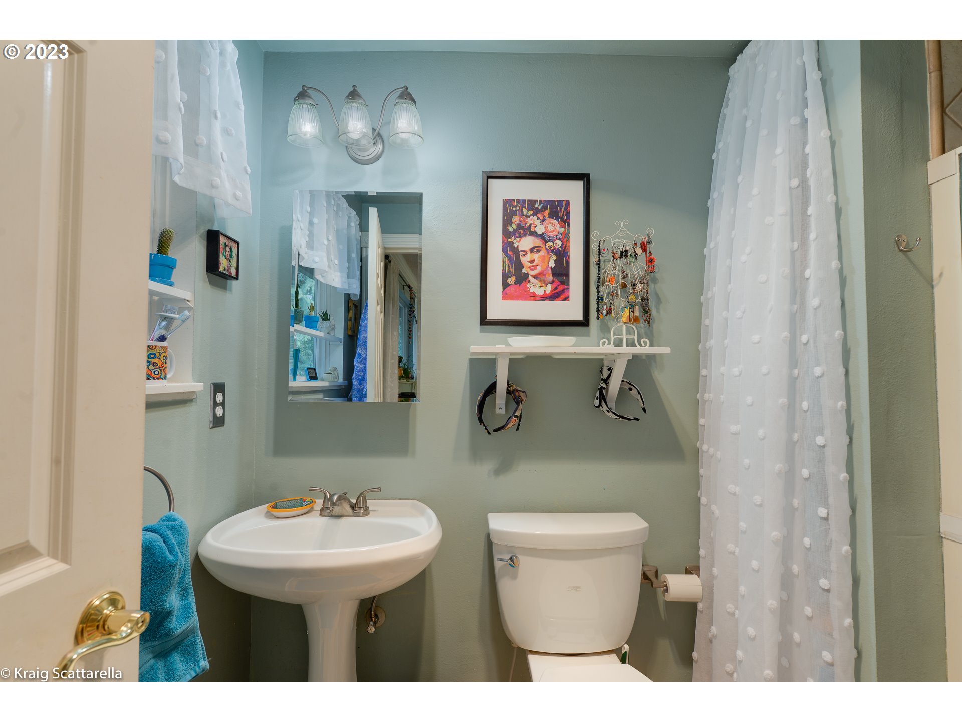 5109 Southwest Boundary Street Portland, OR 97221 - Photo 7 of 20 a bathroom with a toilet sink and mirror