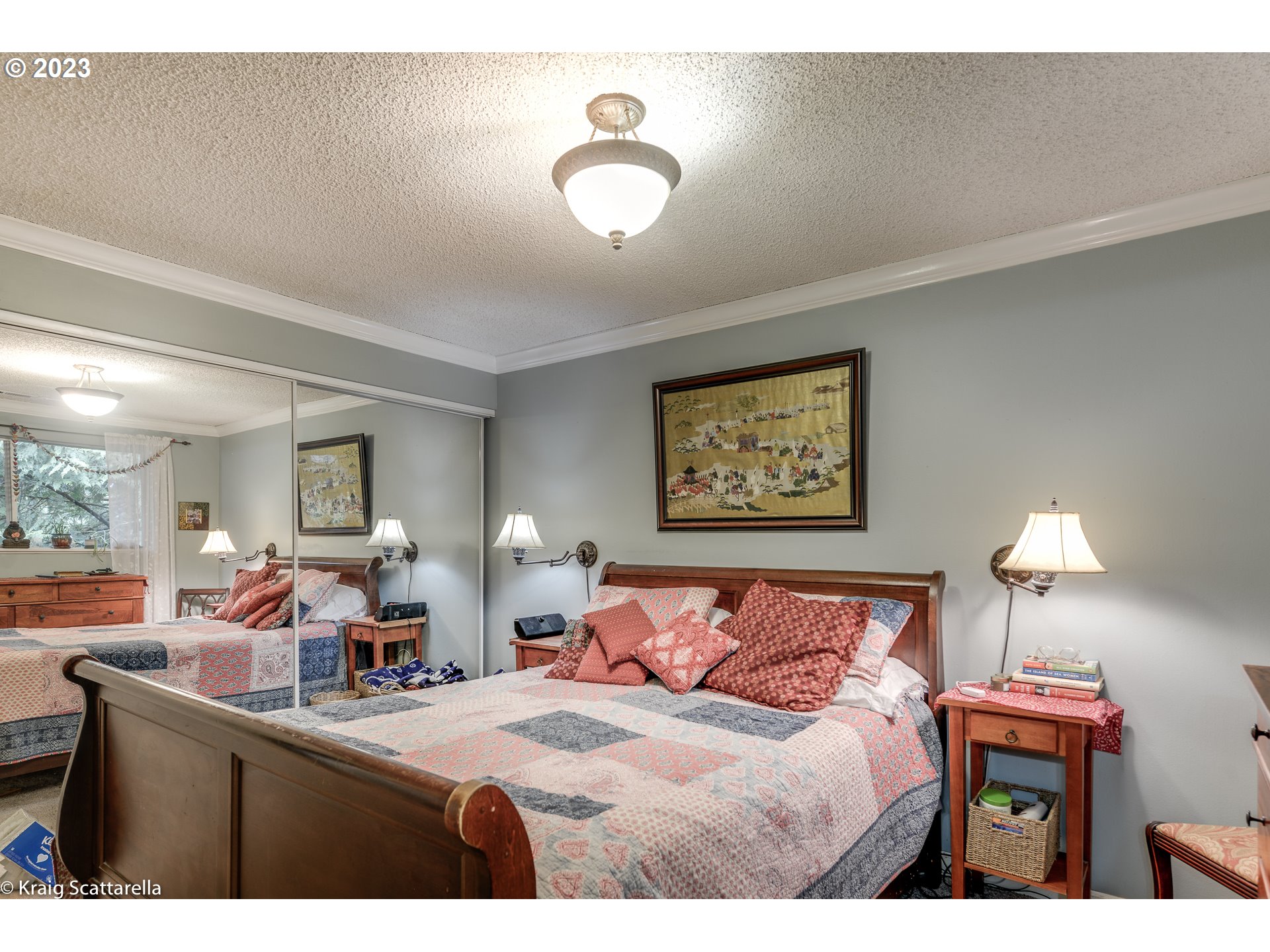 5109 Southwest Boundary Street Portland, OR 97221 - Photo 8 of 20 a bed room with a bed and a table