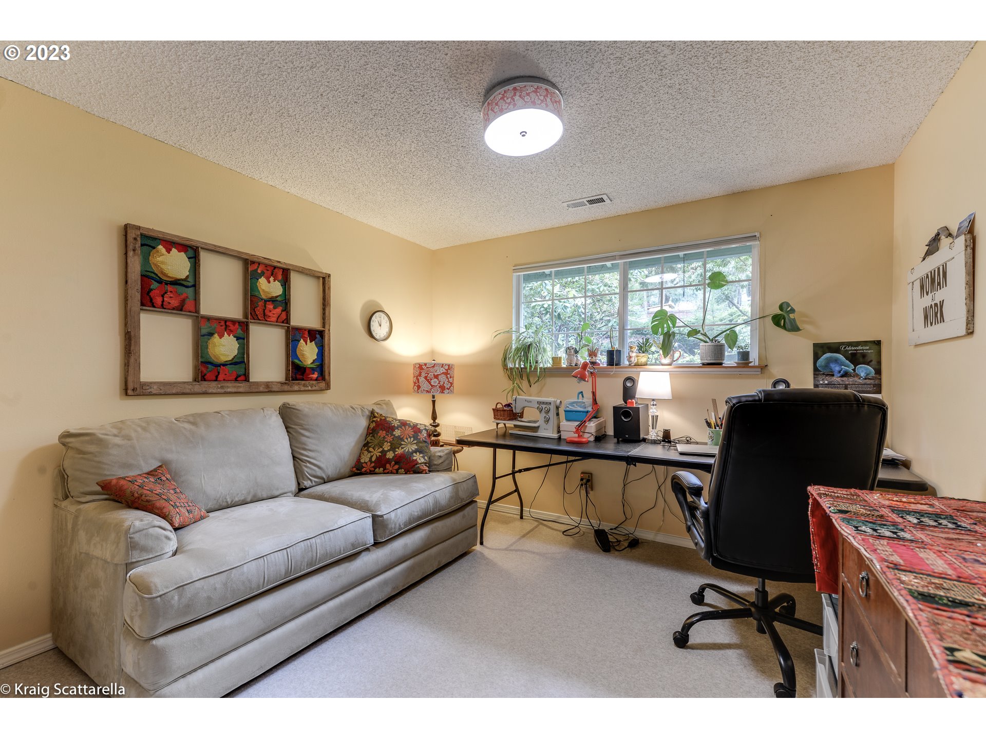 5109 Southwest Boundary Street Portland, OR 97221 - Photo 10 of 20 a living room with furniture and a large window