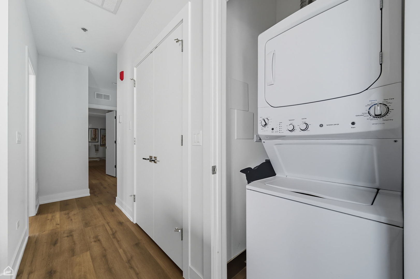 2354 North Washtenaw Avenue, Unit 304 Chicago, IL 60647 - Photo 14 of 16 a utility room with dryer and washer